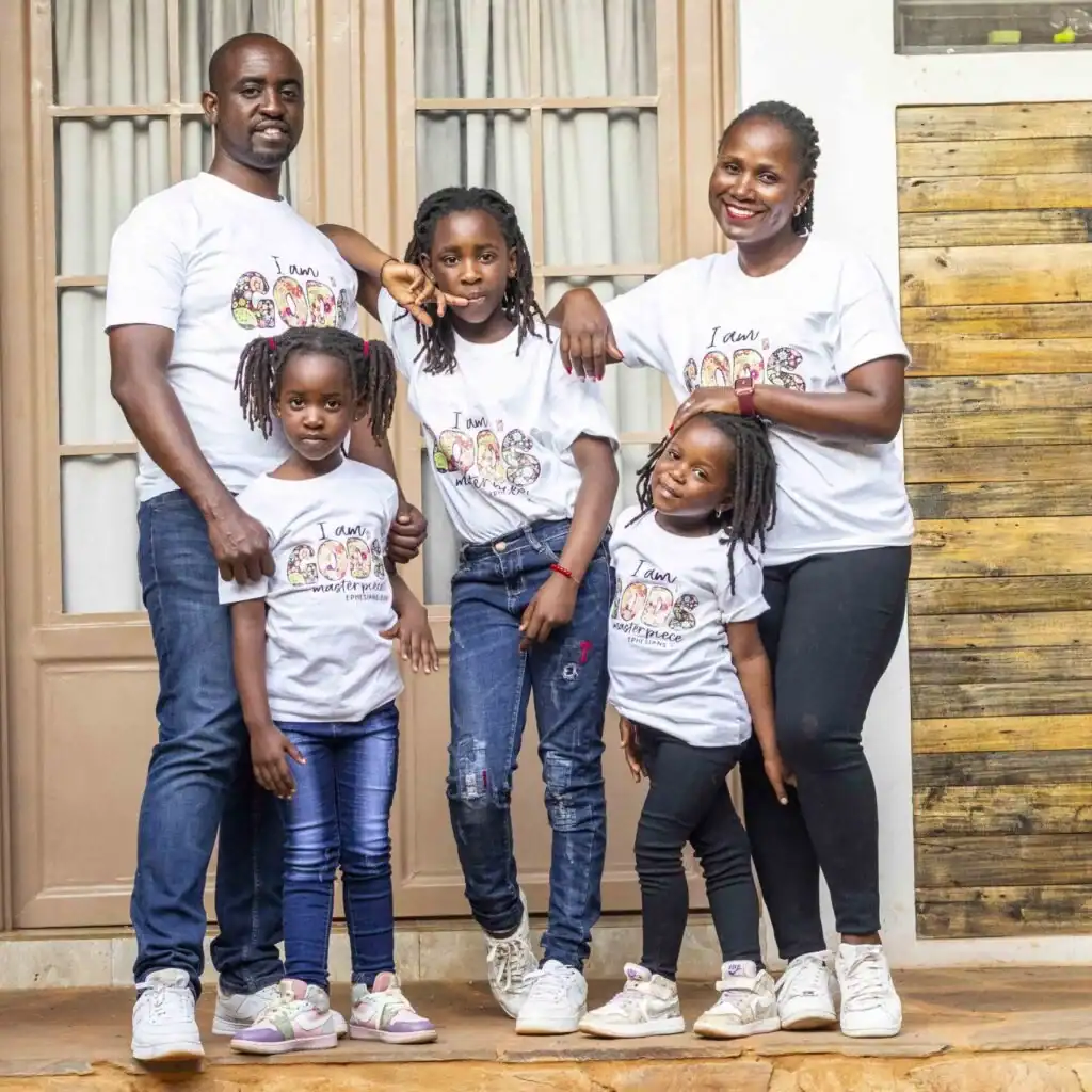 r. Alliance Niyukuri with his wife and three children in matching white family t-shirts
